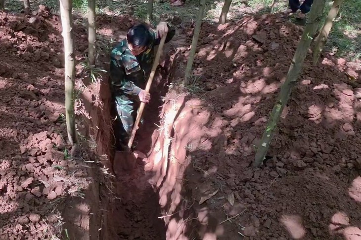 Phát hiện, quy tập hài cốt liệt sĩ tại khu vực biên giới- Ảnh 1.