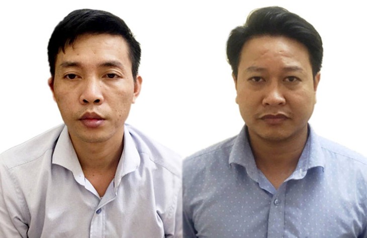 Hai bị can Đỗ Mạnh Tuấn (trái) và Nguyễn Khắc Tuấn.