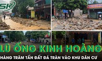 Lũ ống cuốn theo hàng trăm tấn đất đá tràn vào khu dân cư ở Lào Cai