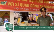 Cảm động hình ảnh người vợ khóc cạn nước mắt bên di ảnh cảnh sát hy sinh vì truy bắt tội phạm