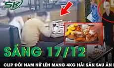 Đi ăn buffet, đôi nam nữ lén mang rượu ngoài vào rồi đút túi 4kg hải sản mang về