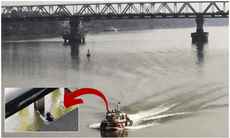 Vui chơi trên cầu Long Biên, thanh niên rơi xuống sông Hồng