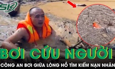 Công an Điện Biên bơi giữa lòng hồ đầy củi, rác tìm kiếm nạn nhân mất tích do bị lũ cuốn trôi