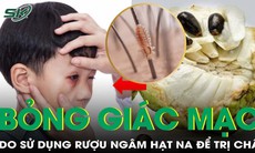 Bỏng kết giác mạc do sử dụng rượu ngâm hạt na để trị chấy