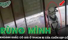 Rùng mình khoảnh khắc cô gái ở TPHCM bị cửa cuốn kẹp cổ, thoát chết trong gang tấc