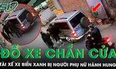 Tài xế xe biển xanh bị người phụ nữ chửi bới, hành hung vì đỗ xe chắn cửa