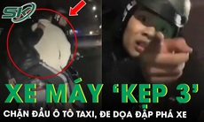 Nhóm thanh niên ‘kẹp 3’ chặn đầu xe taxi, dùng mũ bảo hiểm đập phá xe