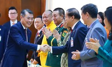 Thủ tướng Lê Minh Hưng gặp cộng đồng người Việt Nam tại Lào