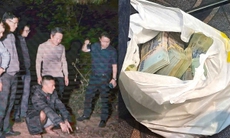 Chấn động màn cải trang người dân tộc thiểu số gùi tiền tẩu thoát của 2 tên cướp ngân hàng