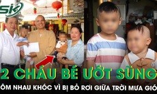 Xót xa cảnh hai cháu bé ướt sũng, ôm nhau khóc vì bị bỏ rơi trước cổng chùa giữa trời mưa tầm tã