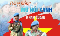 Bóng hồng blouse trắng và mũ nồi xanh ở Nam Sudan