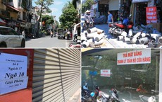 Hàng loạt cửa hàng trên đường Giải Phóng trả mặt bằng