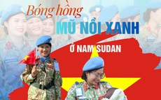 Bóng hồng blouse trắng và mũ nồi xanh ở Nam Sudan