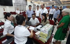 Người dân Định Công nhận tiền bồi thường, đồng lòng bàn giao mặt bằng