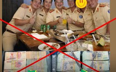 Công an khẳng định hình ảnh CSGT 'ăn mừng' bên những cọc tiền là giả mạo, cắt ghép
