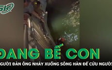 Khoảnh khắc nghẹt thở: Đang đi dạo cùng vợ con, người đàn ông nhảy xuống sông Hàn cứu người