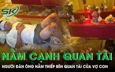 Người đàn ông chi chít vết thương nằm bên cỗ quan tài của vợ con sau trận lũ kinh hoàng