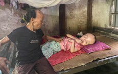 Hơn 3 thập kỷ làm đôi chân cho con gái nằm liệt giường