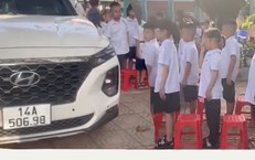 Nữ hiệu phó đỗ ô tô giữa sân trường khi học sinh chào cờ ở Quảng Ninh
