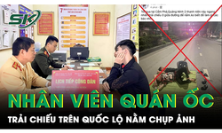 C&#226;u like bất chấp t&#237;nh mạng, 2 nh&#226;n vi&#234;n qu&#225;n ốc trải chiếu tr&#234;n quốc lộ nằm chụp ảnh bị c&#244;ng an mời l&#234;n l&#224;m việc