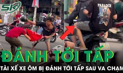 Chỉ va chạm nhẹ, thanh ni&#234;n d&#249;ng mũ bảo hiểm đ&#225;nh tới tấp t&#224;i xế xe &#244;m c&#244;ng nghệ