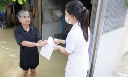 Hà Nội cử các tổ công tác xuống vùng ngập lụt chủ động giúp dân phòng dịch sau lũ