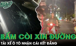 Bấm còi xin đường, tài xế ô tô bị nhóm ‘quái xế’ chặn xe, đập vỡ kính