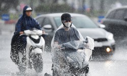 Miền Bắc kết thúc đợt nắng nóng kỷ lục, chuyển mưa dông rải rác