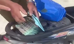 Nam thanh niên chảy máu mặt nằm bất tỉnh giữa đường, trong cốp xe có gần 400 triệu đồng