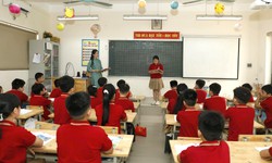 Sau sáp nhập trường học, định mức tiết dạy của giáo viên được tính thế nào?