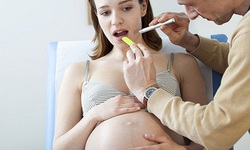 V&#236; sao mẹ bầu dễ mắc bệnh răng lợi?