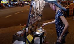 Hoa hậu Thùy Tiên mặc đồ bộ bán khô mực đêm Sài Gòn