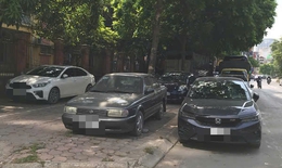 Đỗ xe trước cổng cơ quan có phạt tiền?
