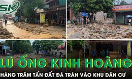 Lũ ống cuốn theo hàng trăm tấn đất đá tràn vào khu dân cư ở Lào Cai