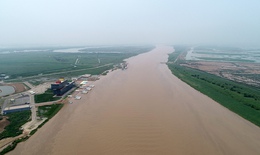 Trung Quốc nâng mức cảnh báo màu vàng về mưa lũ