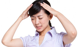 Tác động cột sống có chữa được đau đầu?