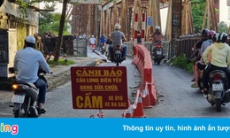 Cầu Long Bi&#234;n được lắp dải ph&#226;n c&#225;ch ngăn xe ba g&#225;c