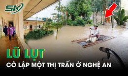 Nước lũ d&#226;ng cao chạm n&#243;c nh&#224; d&#226;n, c&#244; lập một thị trấn ở Nghệ An