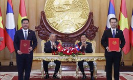 Tổng B&#237; thư T&#244; L&#226;m v&#224; Tổng B&#237; thư, Chủ tịch nước L&#224;o chứng kiến Lễ trao c&#225;c văn kiện hợp t&#225;c