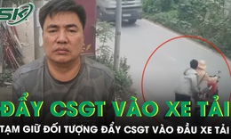 Tạm giữ h&#236;nh sự đối tượng đẩy đại &#250;y cảnh s&#225;t v&#224;o đầu xe tải ở H&#224; Nội v&#236; &#39;xin bỏ qua vi phạm kh&#244;ng được&#39;