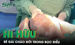 Hi hữu bé gái chào đời trong túi ối nguyên vẹn