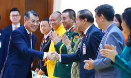 Thủ tướng Lê Minh Hưng gặp cộng đồng người Việt Nam tại Lào