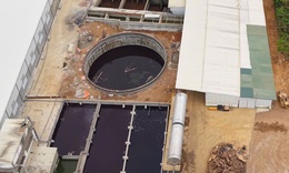 Tạm dừng hoạt động giặt là của nhà máy may khiến nước sinh hoạt đổi màu tím