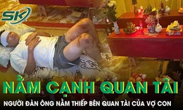 Người đàn ông chi chít vết thương nằm bên cỗ quan tài của vợ con sau trận lũ kinh hoàng