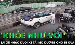 Tài xế nhấc đuôi xe tải mở đường, dân mạng tròn mắt ví "khỏe như voi"