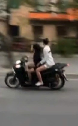 Hai cô gái đi SH lạng lách, không đội mũ bảo hiểm bị phạt nặng