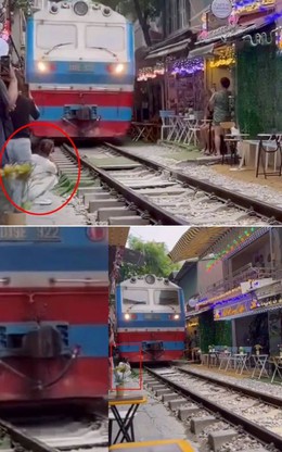 Thót tim khoảnh khắc cô gái bị tàu hỏa hất văng điện thoại ở ‘phố cà phê đường tàu’