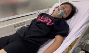 Nhắc đỗ ô tô sai trên vỉa hè, nữ chủ nhà bị đánh nhập viện