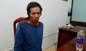Người nhặt ve chai dùng đá đập chết thanh niên chụp ảnh mình