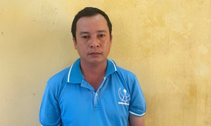 Xâm phạm mồ mả, tài xế lái máy xúc bị khởi tố bắt giam